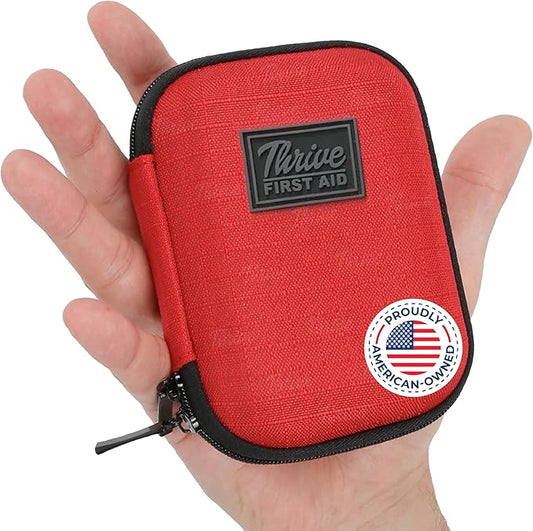 Thrive Travel Essentials Mini First Aid Kit – 66 Pieces of FSA and HSA Approved Supplies Including Bandages, Wipes, Safety Pins, and More | Compact Emergency Kit in Shell Case